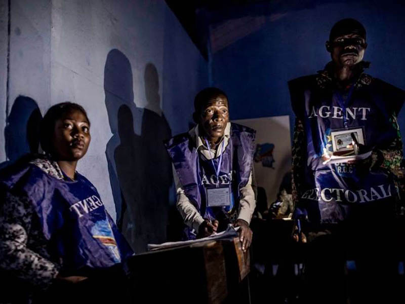 03 SL3 DRC polling officials hear instructions ahead of the nations Dec 30 presidential elections Credit Luis Tato AFPGetty Images